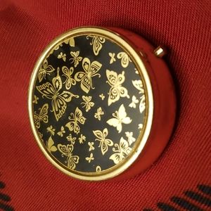 Butterfly decorated pill box black and gold tone earing case storage made Japan